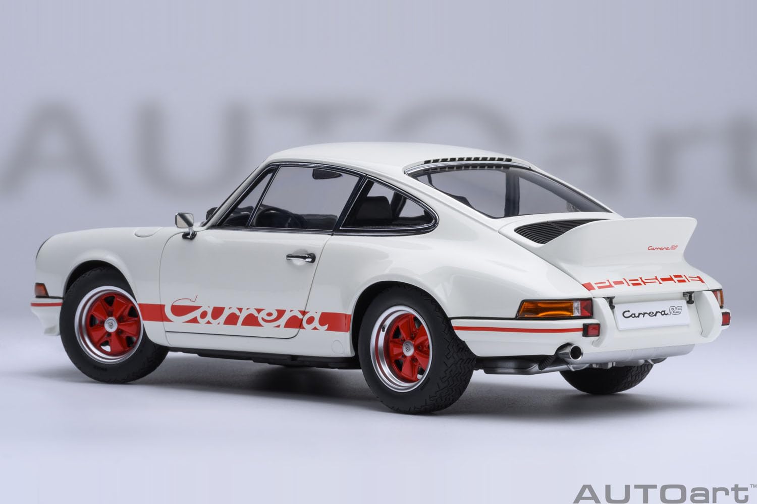 Autoart 1/18 Porsche 911 Carrera 2.7 RS Model in Grand Prix White with Red Stripes